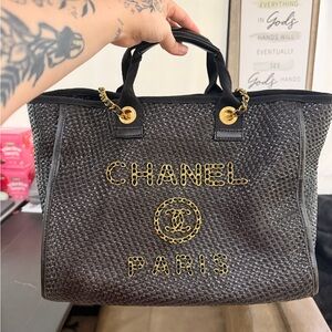 CHANEL Black Woven Tote with Gold Chain Logo